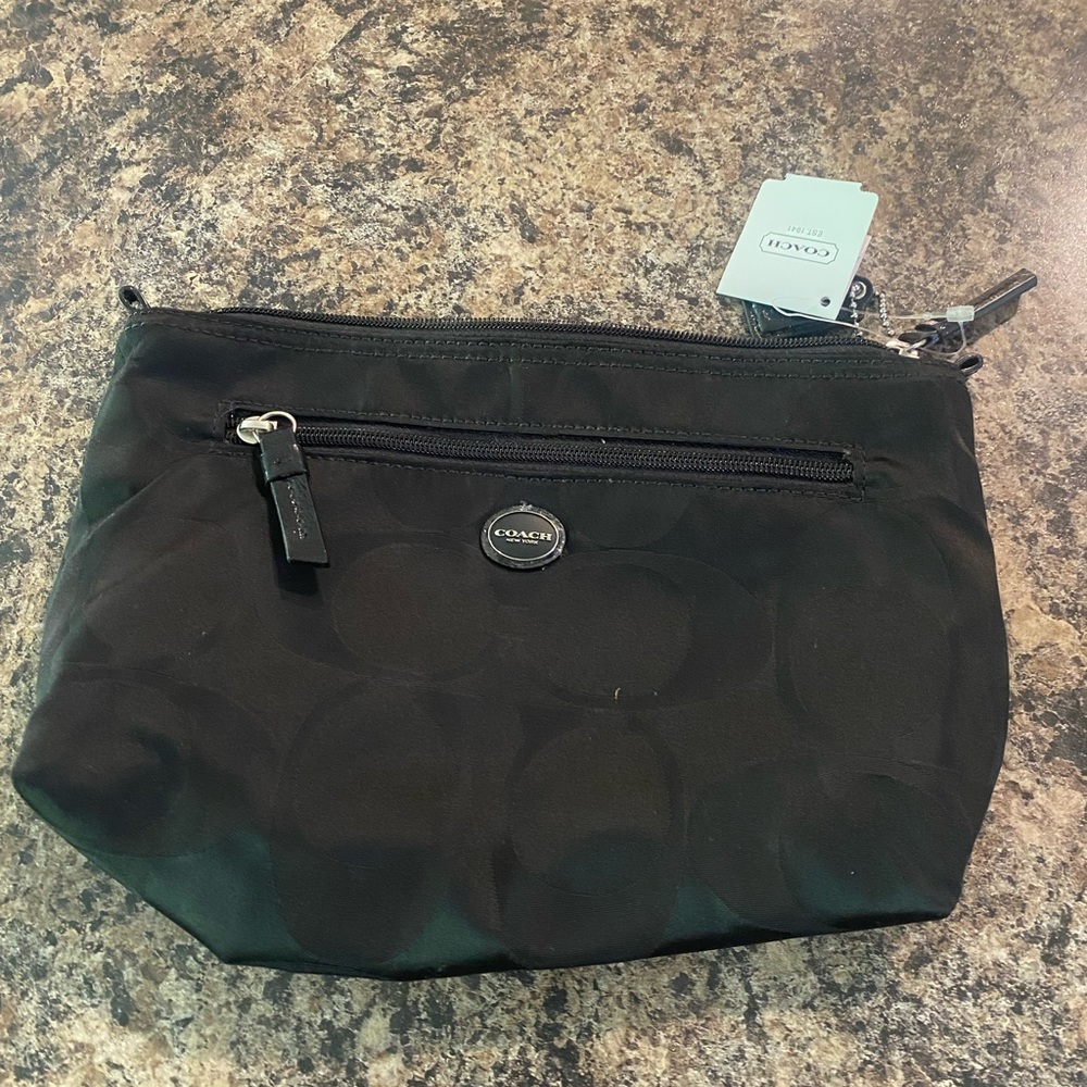 Coach makeup bag. NWT.